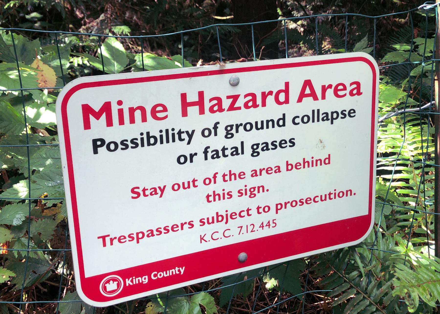 sign warning of ground collapse or fatal gases