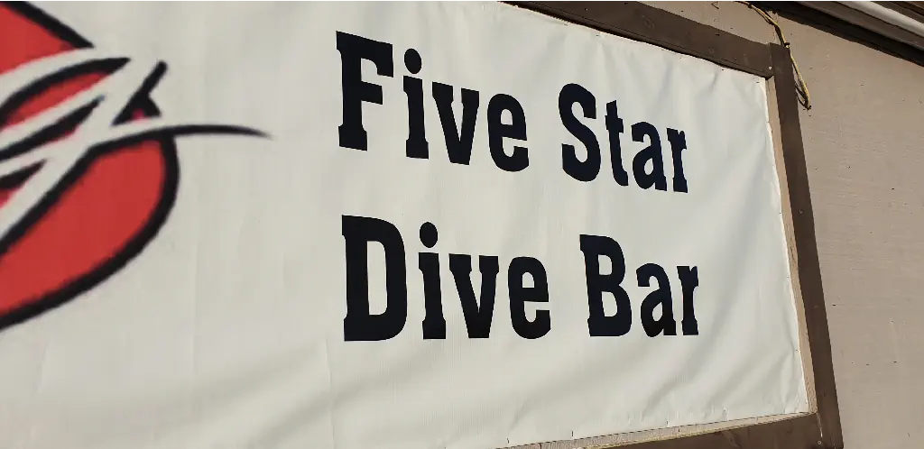 sign declares this is a &ldquo;Five Star Dive Bar&rdquo;