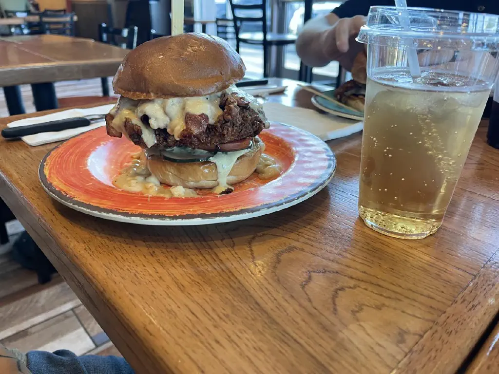 Gigantic bacon fried chicken burger with gravy