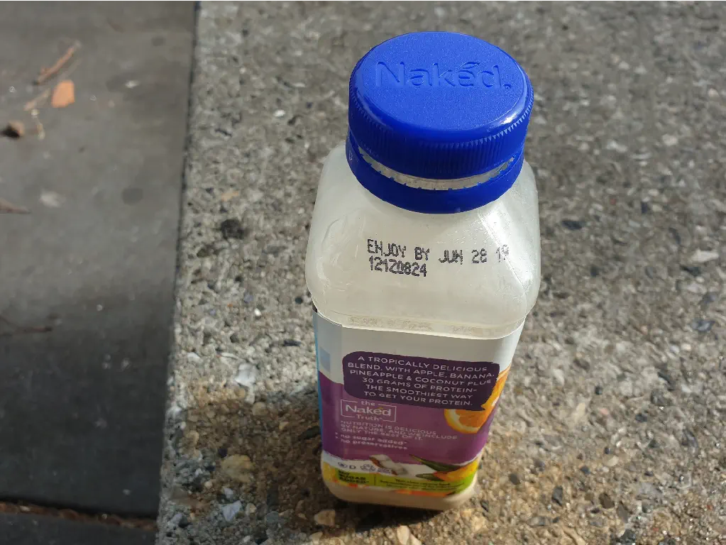 empty protein drink bottle with &ldquo;best by&rdquo; date over a week ago