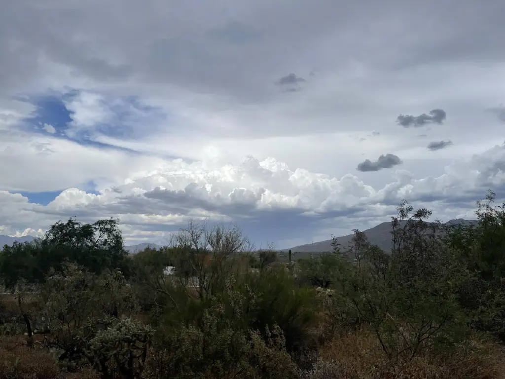 Dramatic clouds with hints of blue sky