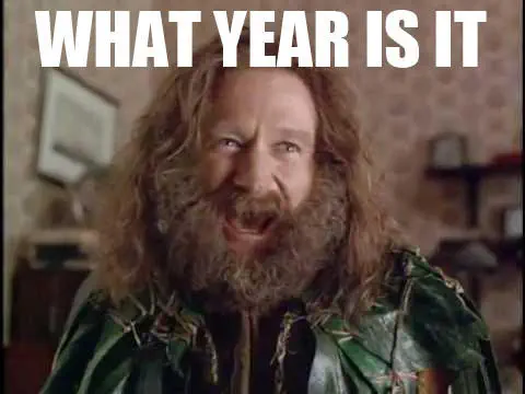 bushy beardy Robin Williams from Jumanji; caption reads “WHAT YEAR IS IT”