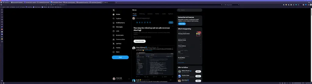 Ultrawide screenshot showing much blank space, ancillary content like trending and promos for Premium, and a single tweet