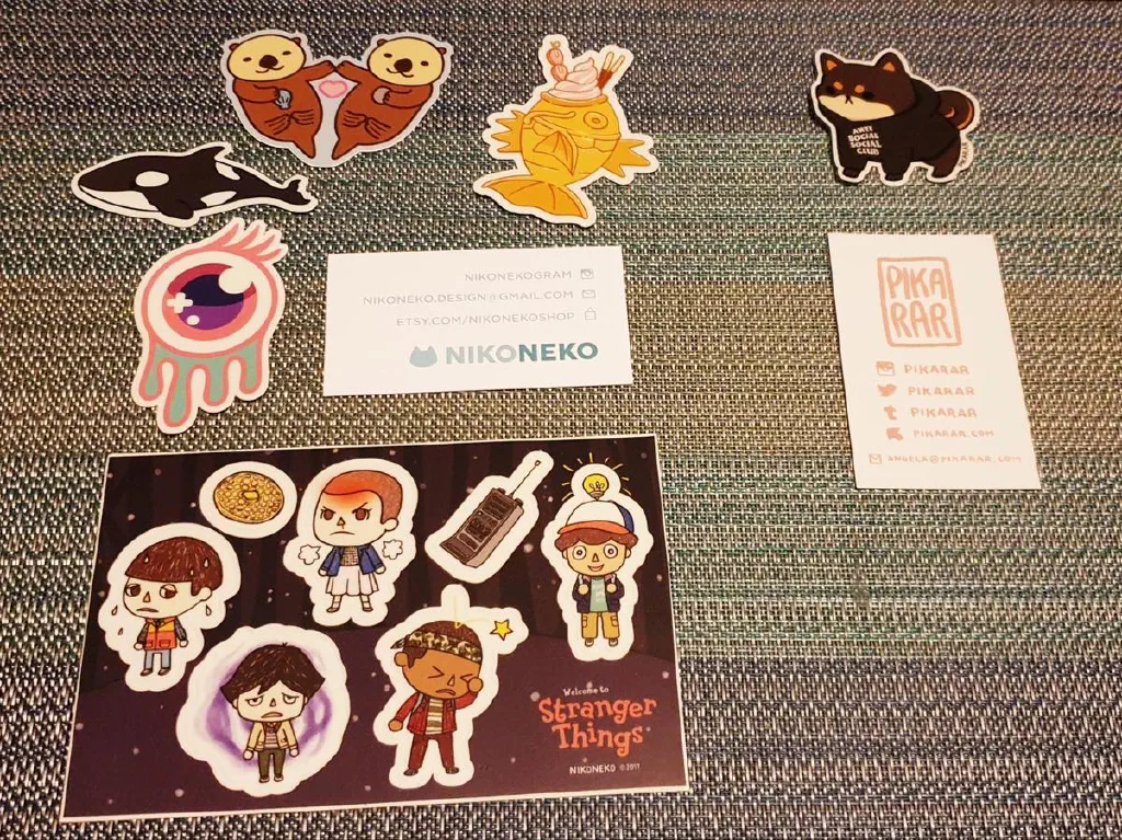 Stickers by artists Nikoneko and pikarar