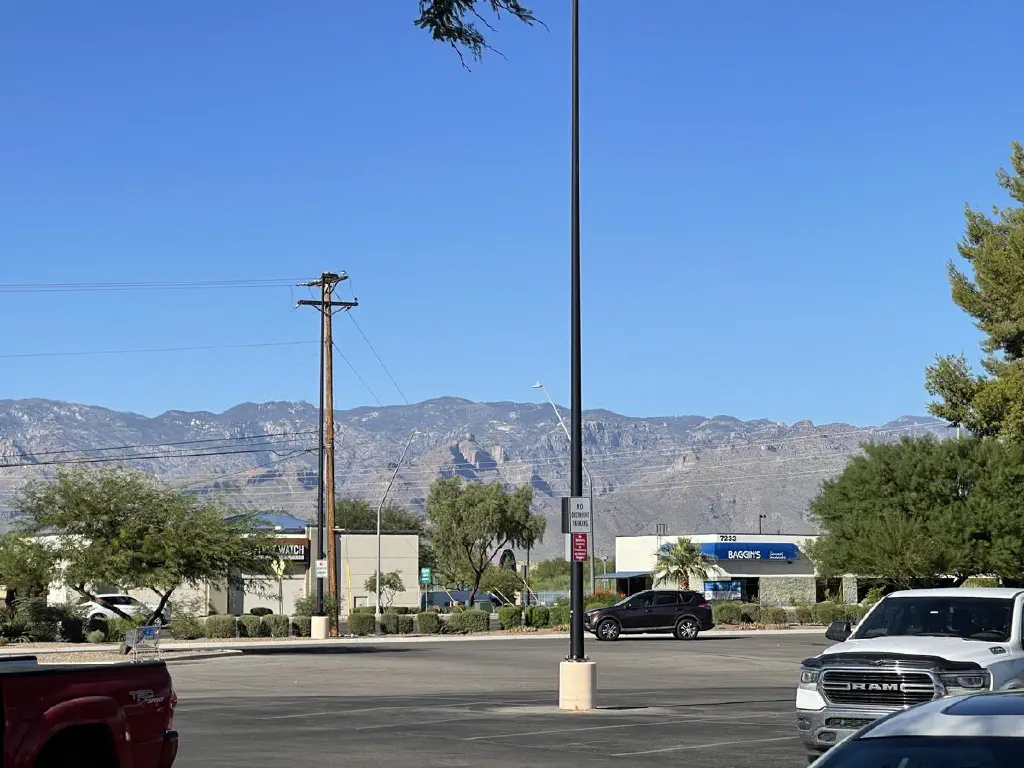 More of the mountains, viewed from a parking lot