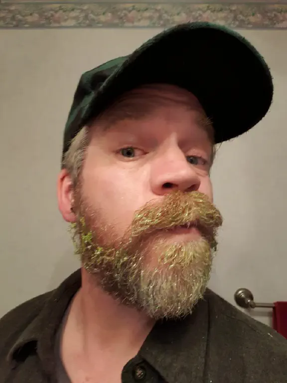 Selfie with green glitter glue in beard