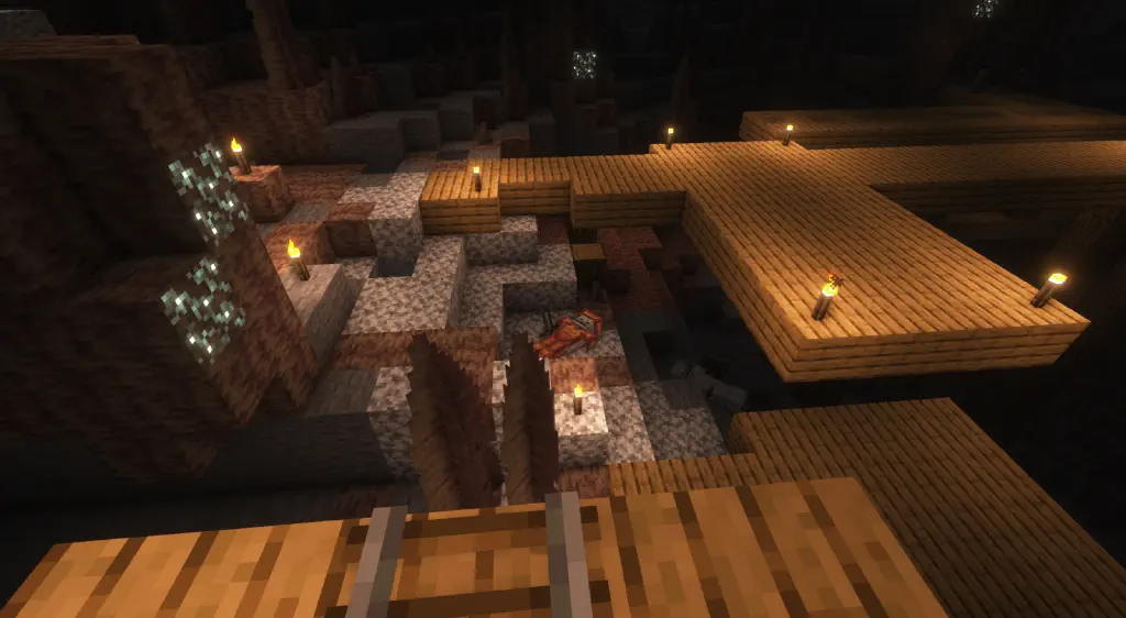underground scene with two armored corpses, representing previous player deaths