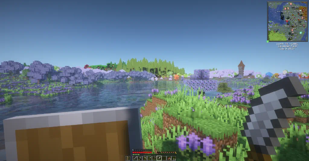 Minecraft scene of shaded lavender fields and a jarringly green forest in the distance.