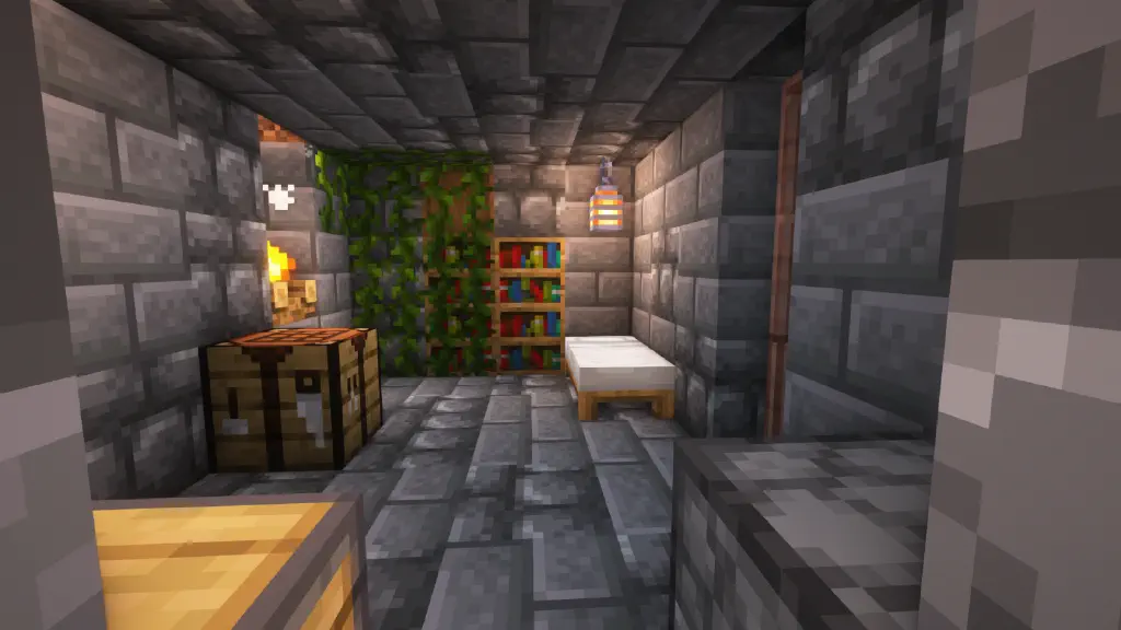 Inside a tiny cramped Minecraft house with ivy obscuring some bookshelves, but the essentials are in place and there&rsquo;s a nice mix of stone tile types