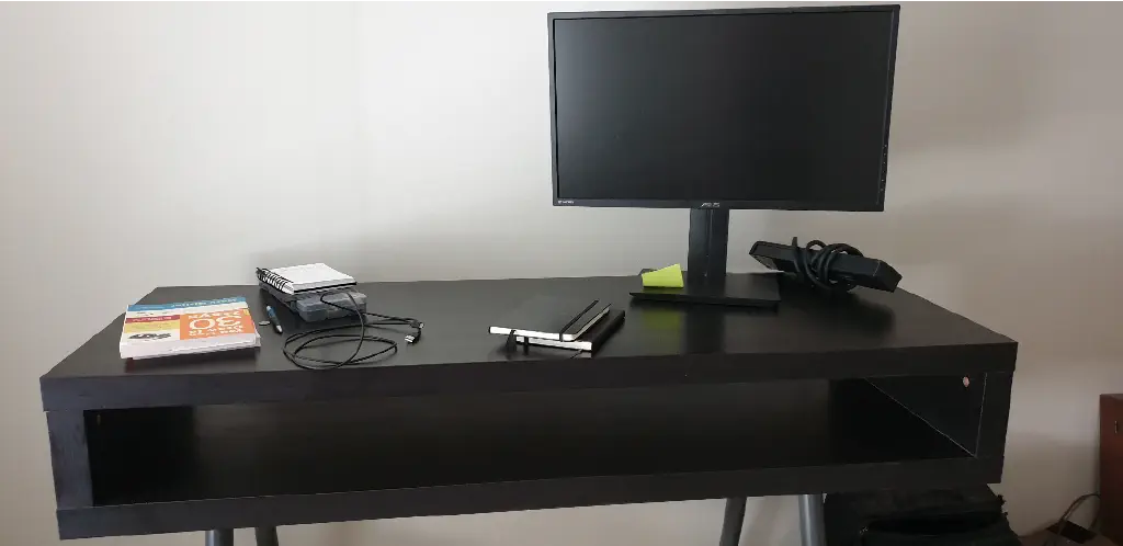 IKEA hack standing desk with one unconnected monitor
