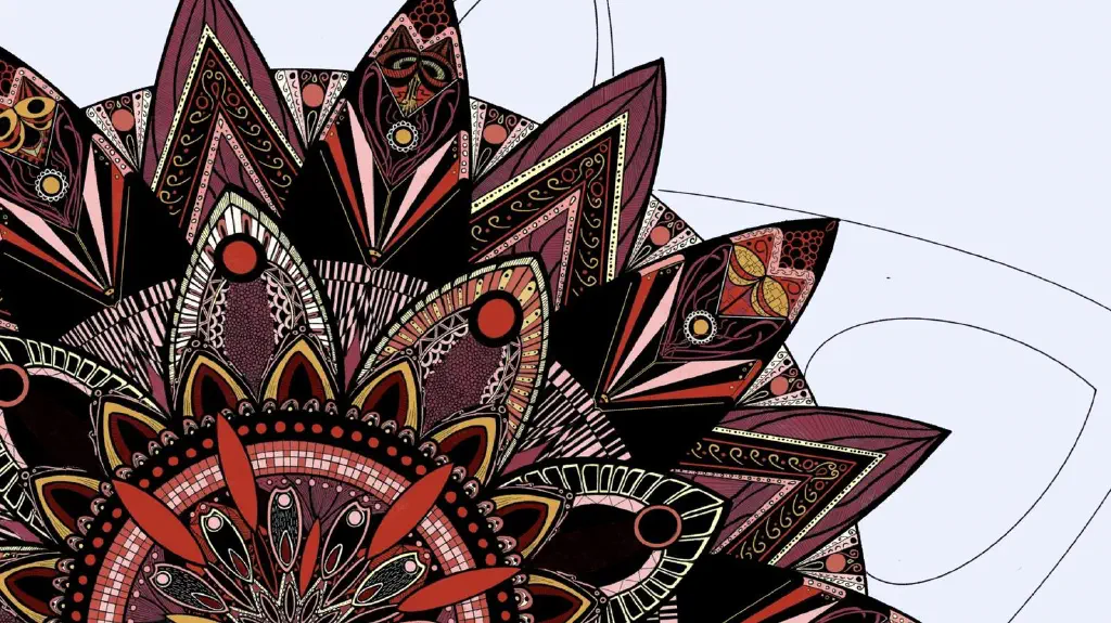 Detail of in progress mandala drawing with red and yellow color added