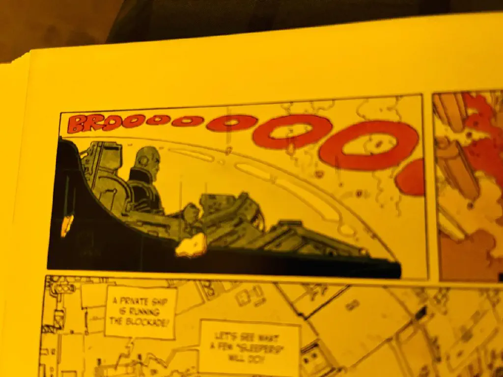 Figure at the cockpit of a sci-if vehicle; vehicle engine sound effect onomatopoeia reads “BROOOOOO” with ever-larger “O” letters