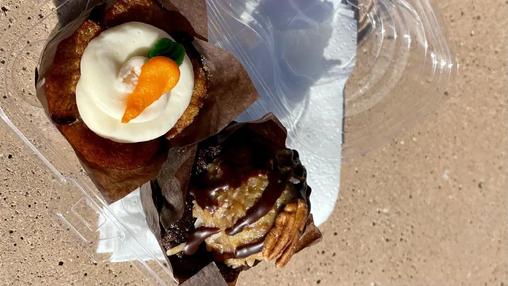 Overhead sunlit view of carrot cake cupcake and German chocolate cupcake 