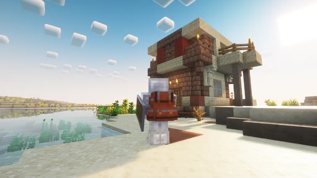 3rd person view of Minecraft player in iron armor with shield and a backpack, looking away from camera at a two story block house with veranda in the desert. Nearby is a patch with crops growing.