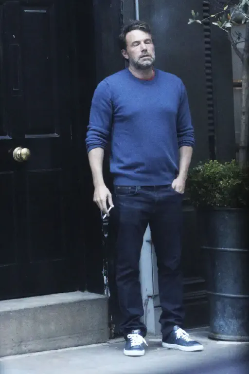 Ben Afflek, looking very tired and having a smoke