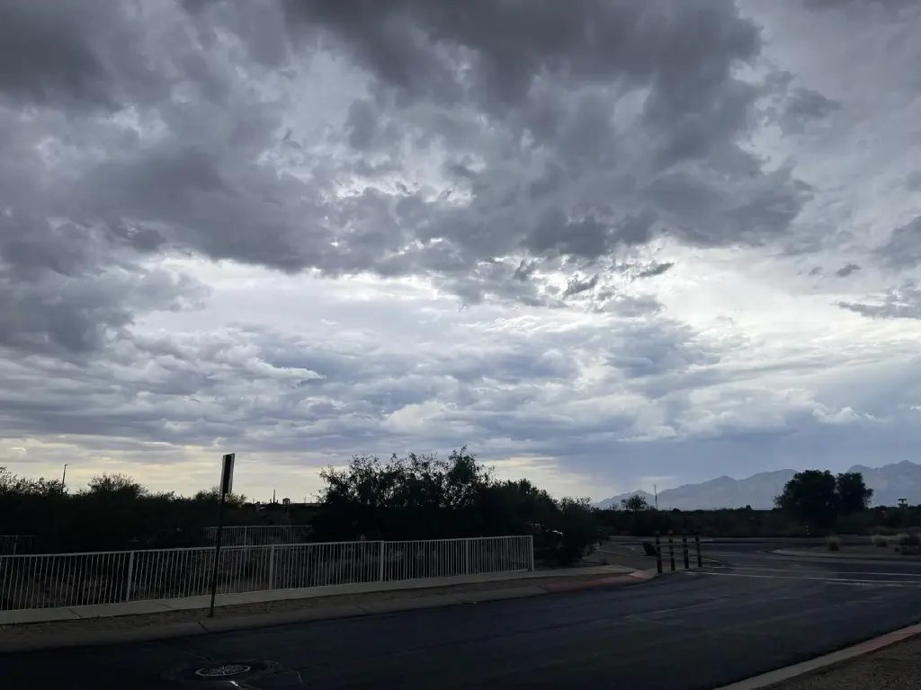 Dramatic clouds layered over a different part of the skyline. 