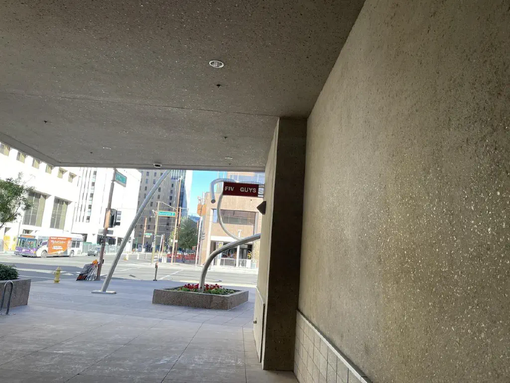 Sign on side of building for “FIV GUYS”