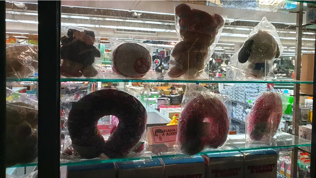 random stuffed knickknacks in a storefront window