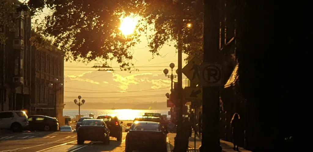 sunset view of Puget Sound from Main Street in Seattle