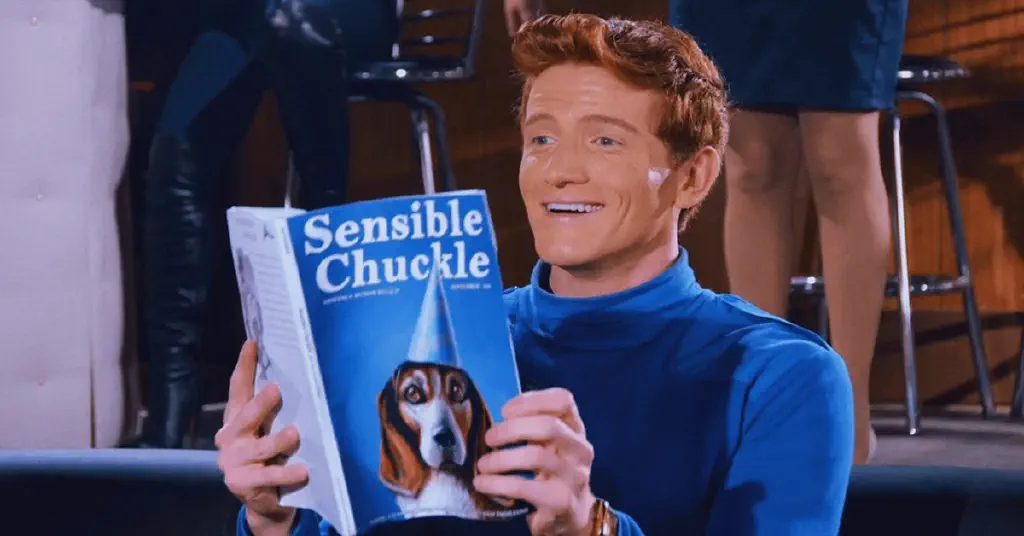 man reads &ldquo;Sensible Chuckle&rdquo; magazine, chuckling sensibly