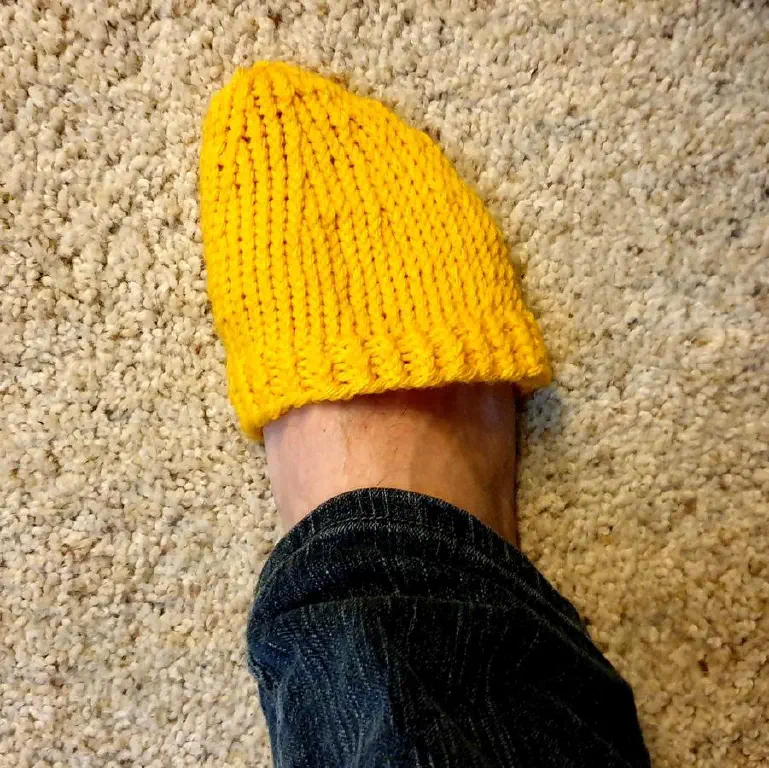Knitted yellow toe warmer
