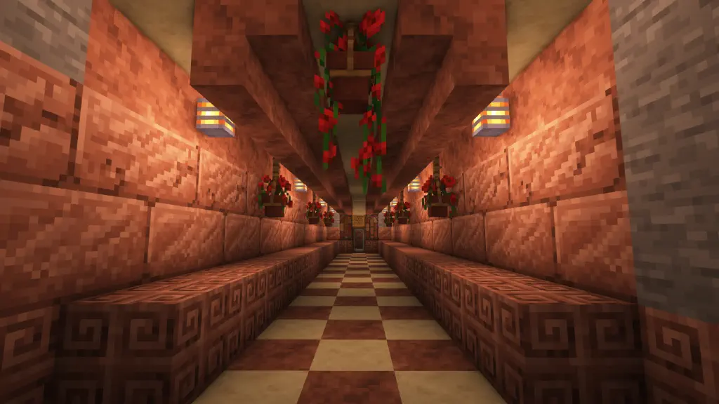 Tunnel with tiled floor and decorative walls using granite and sandstone, recessed lighting, hanging flower pots containing red poppies; tunnel ends at glass door surrounded by stained glass