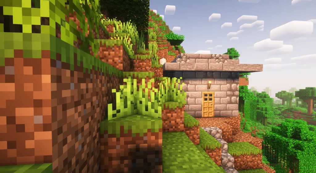 On the side of a steep hill sits Minecraft block house made from a mix of stone bricks and cobblestone bricks, with roof made of stone stairs and slabs.