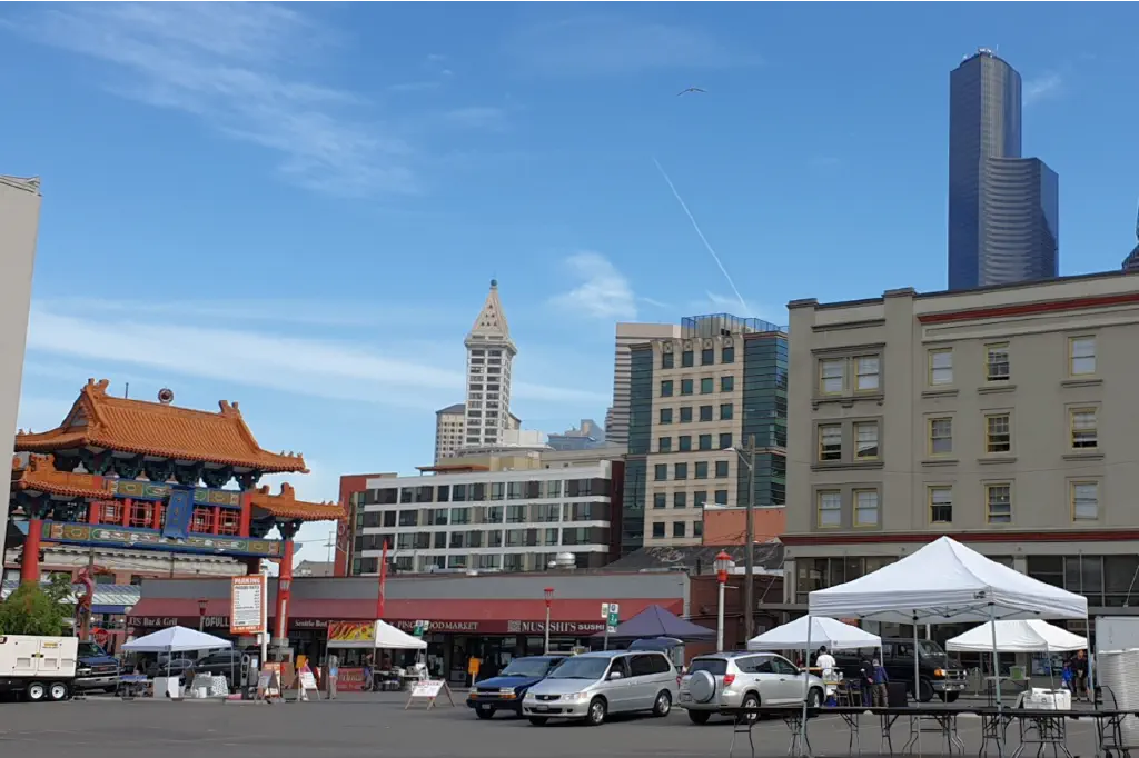 Seattle&rsquo;s Chinatown gate, Smith Tower, and Columbia Tower