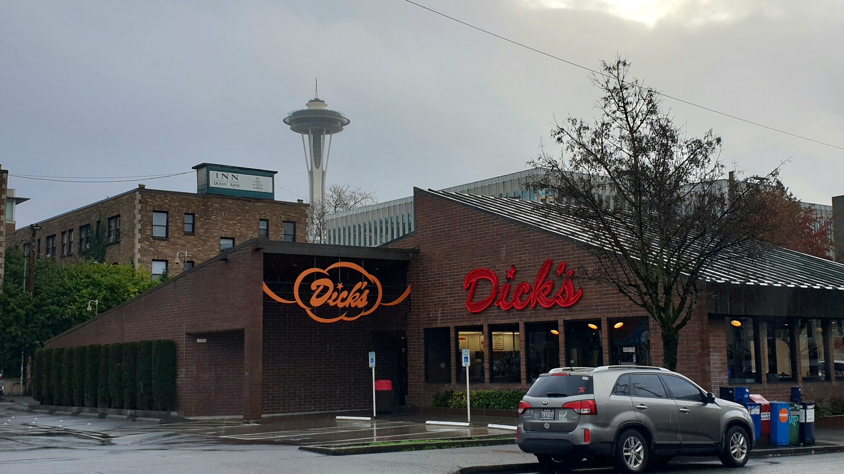 Foreground: Dick’s Burgers: background: space needle