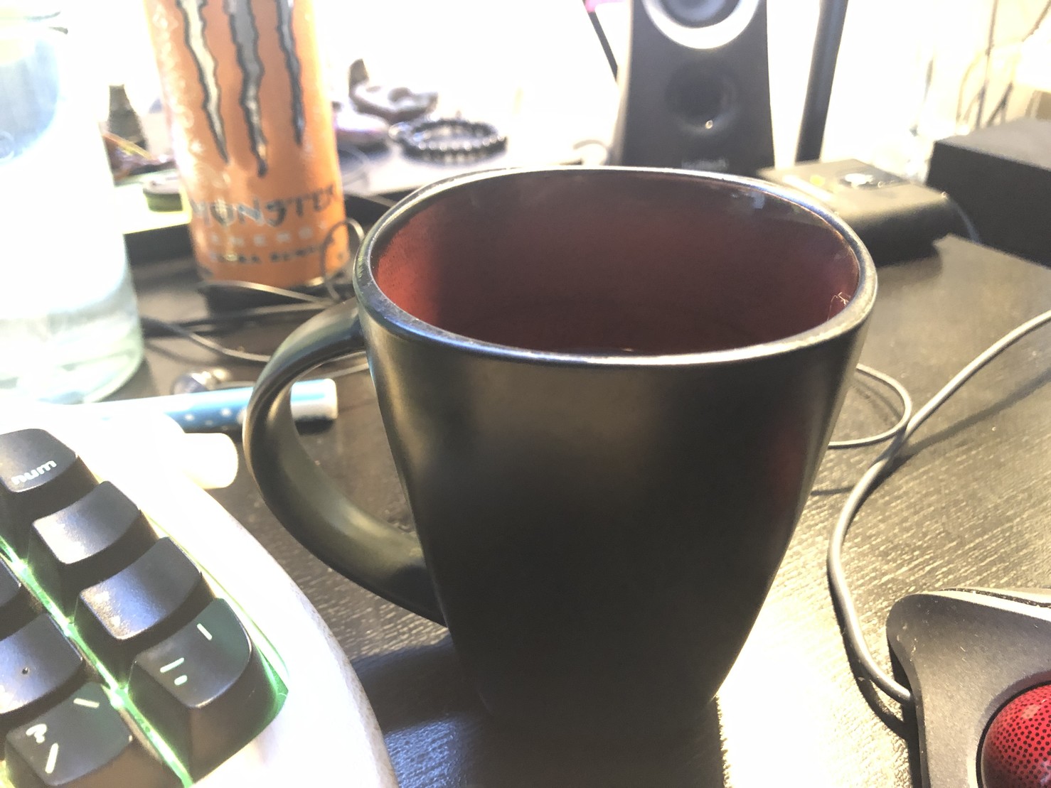 Half empty cup of coffee on desk