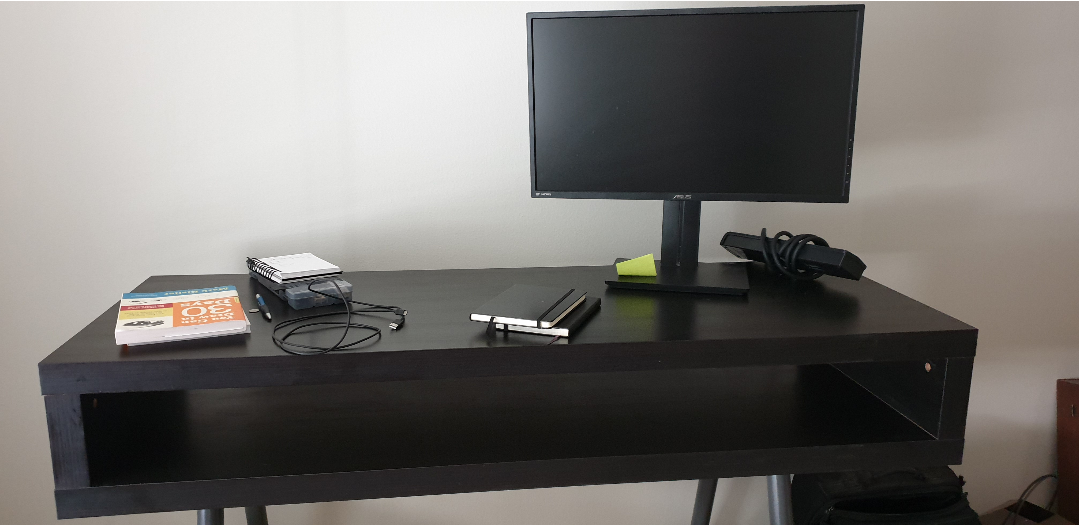 IKEA hack standing desk with one unconnected monitor