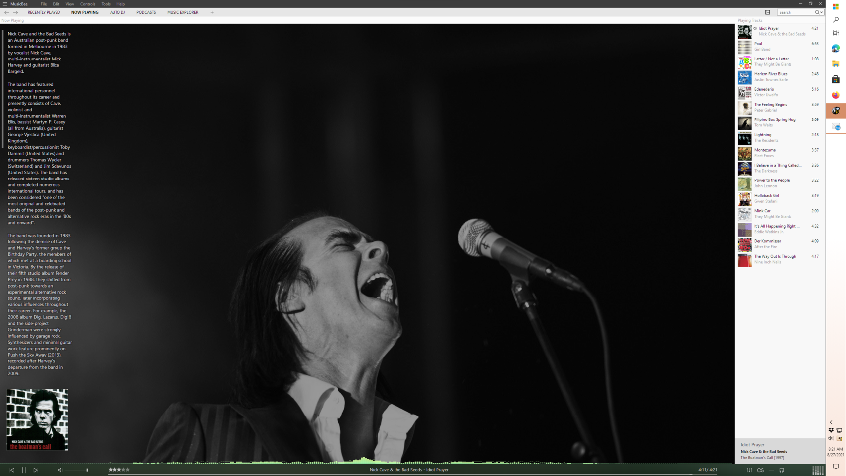 Screenshot of music player with big image of Nick Cave for current track, and an upcoming playlist of moody, pop, and jazz songs.