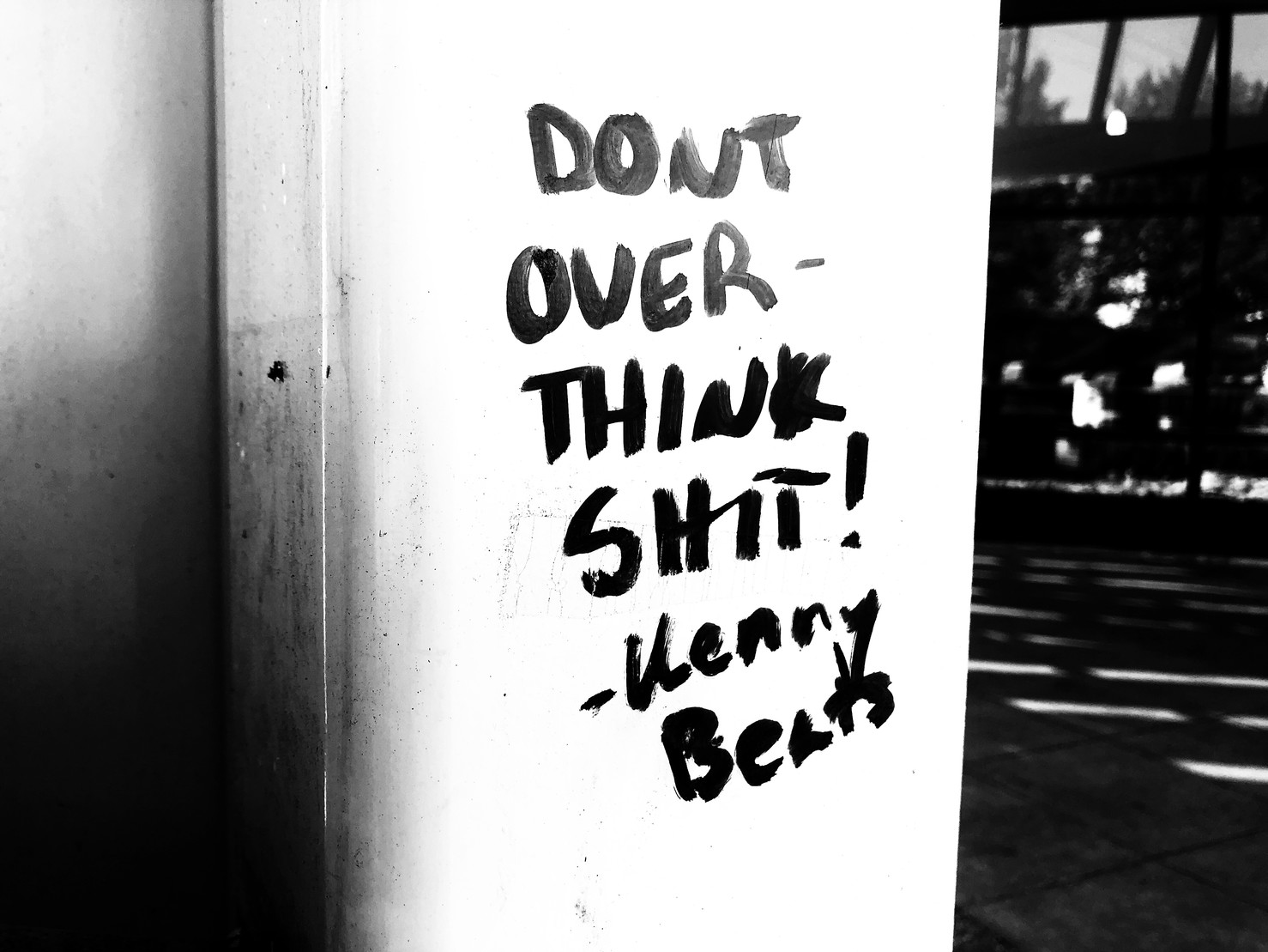 Simple text graffiti reading “DONT OVER-THINK SHIT!”