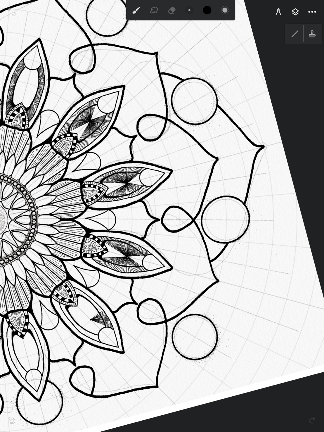 Detailed mandala drawing in progress. 