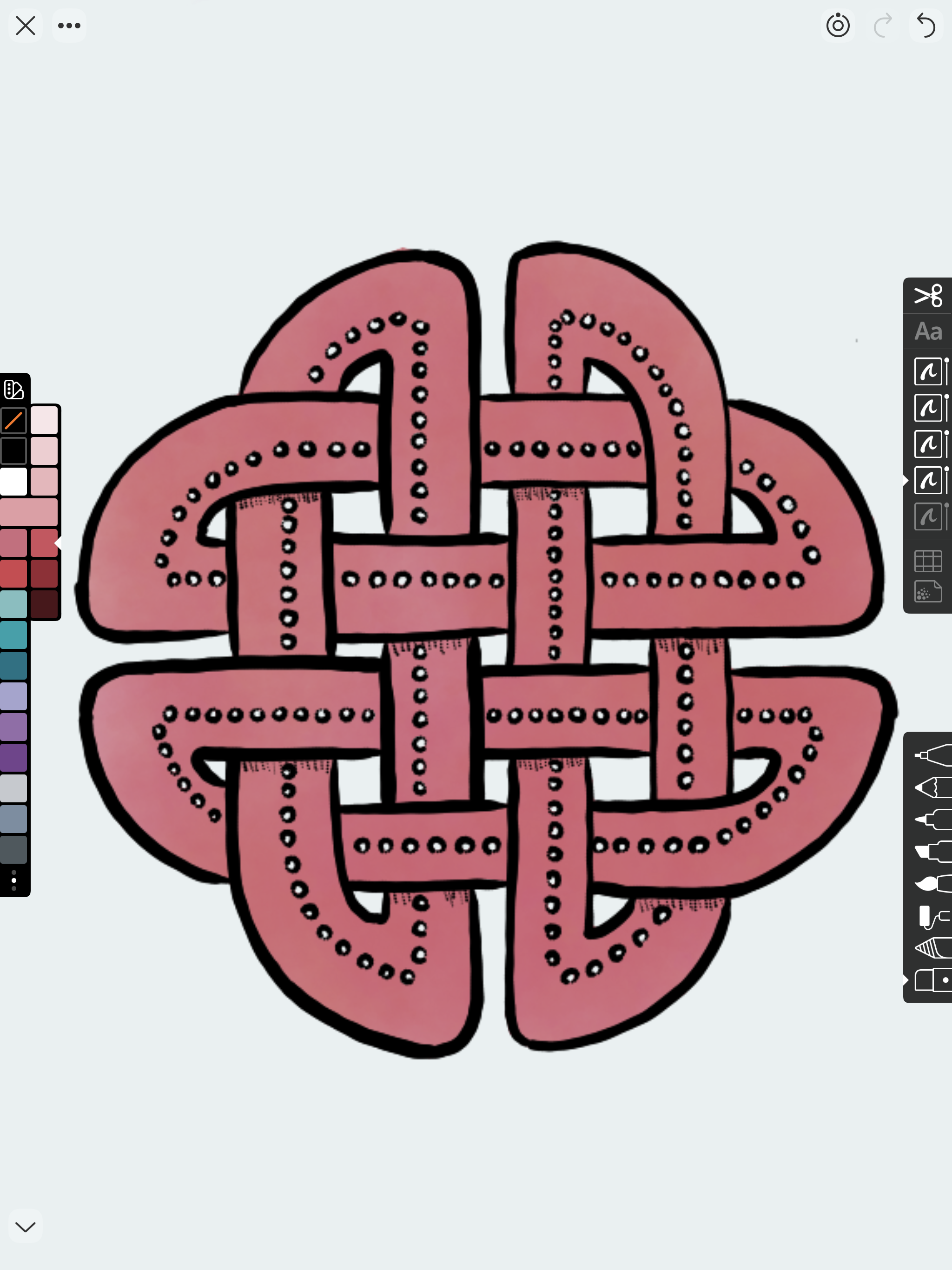 Red knotwork piece decorated with white circles